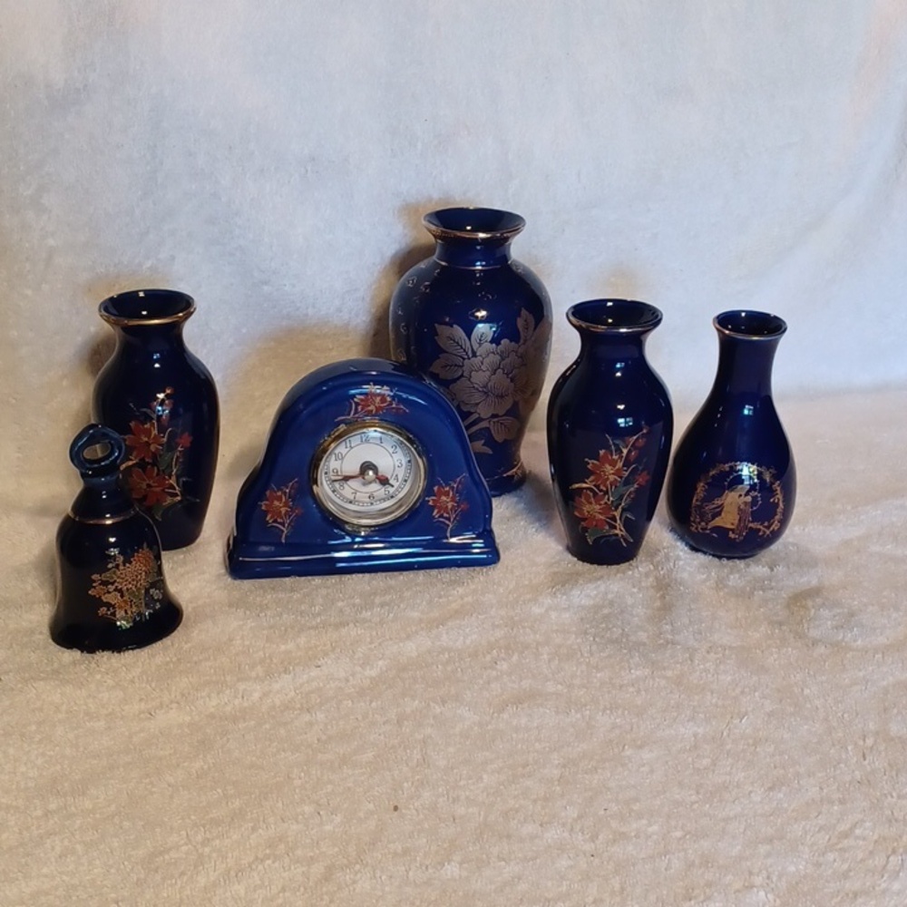Handpainted blue porcelain vases clock and bell